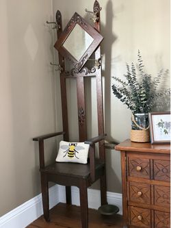 Vintage hall tree with umbrella holder.
