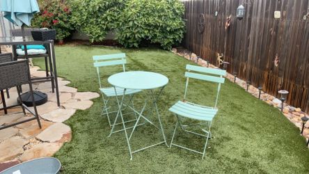 Outdoor cafe table and chairs