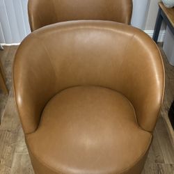 Two Swivel Chairs
