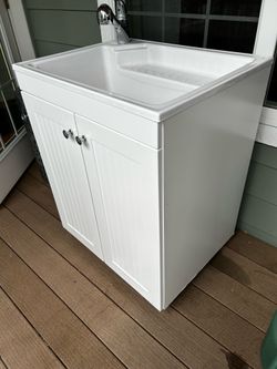 Utility room cabinet with sink/faucet