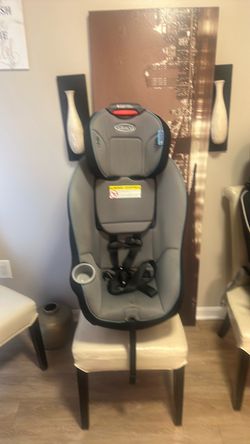 Graco 8 position car seat good condition/ rear and front face car seat