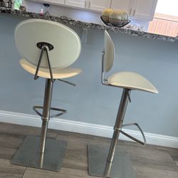 2 Ivory faux leather adjustable bar stools