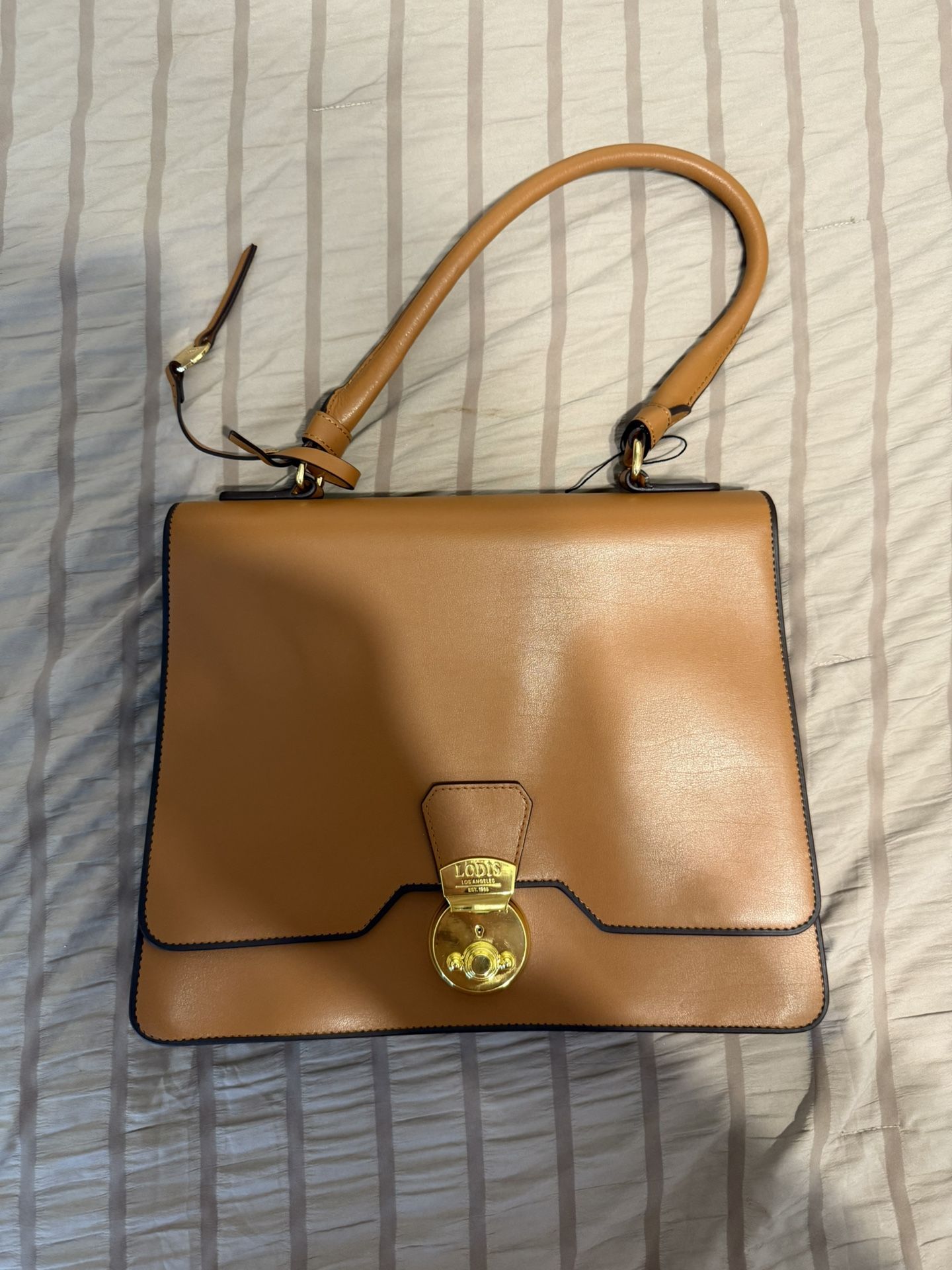 Lodi’s hand bag