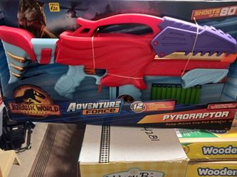 Jurassic world pyroraptor toy gun