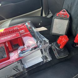 NEVER USED Milwaukee Charger + Bluetooth Job Site Speaker + TWO M12 batteries