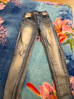 Light Wash Distressed Skinny Jeans