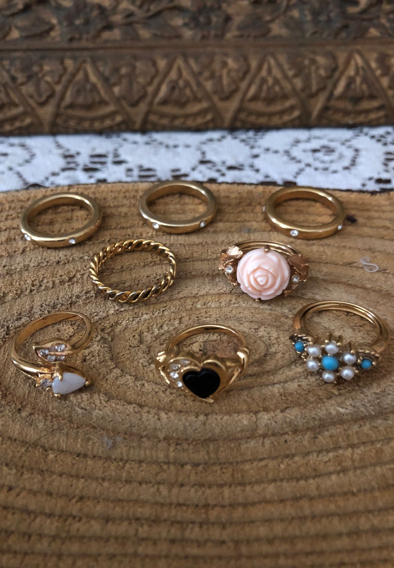 8 vintage Avon rings