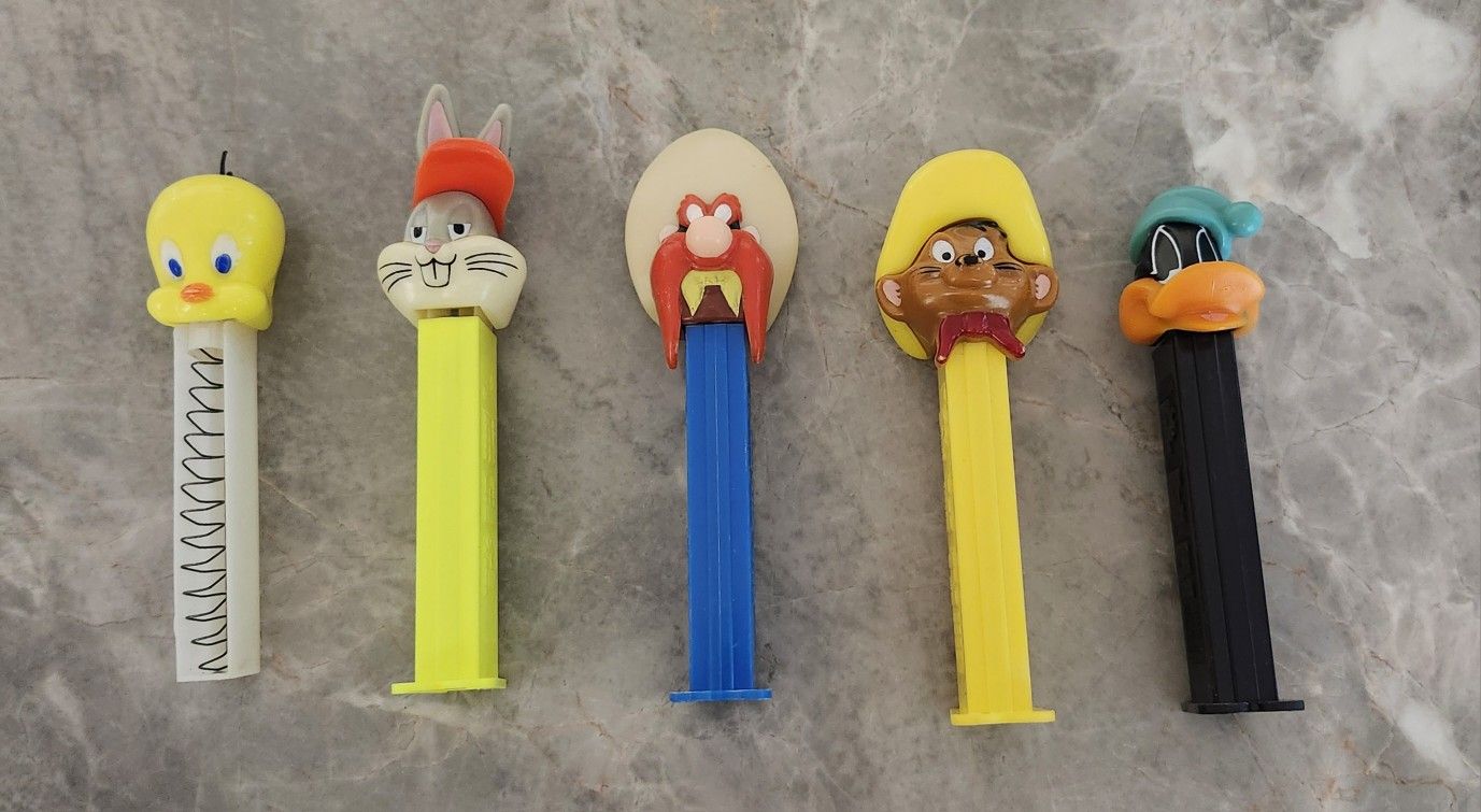 PEZ Dispensers Lot of 5 Looney Tunes Daffy Duck Tweety Taz Bugs Bunny Sam