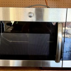Over The Top Of A Range Or Stove GE Microwave 