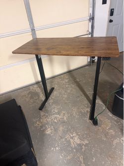 Brown powered electric sit to stand desk