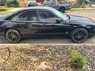 Black Mazda millennia 1999