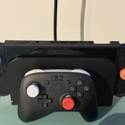 Nintendo Switch 2, Extra Storage, Screen Protector, Joy-con Grips, Travel Case, Switch Case, Original Box With All Accessories And 2 Games.