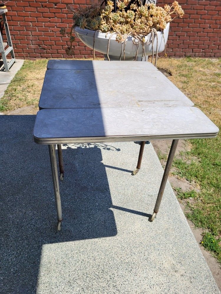 A Vintage Antique Type Writer Table On Wheels 🛞 Needs A Cleaning Both  Sides Fold Down On Table 