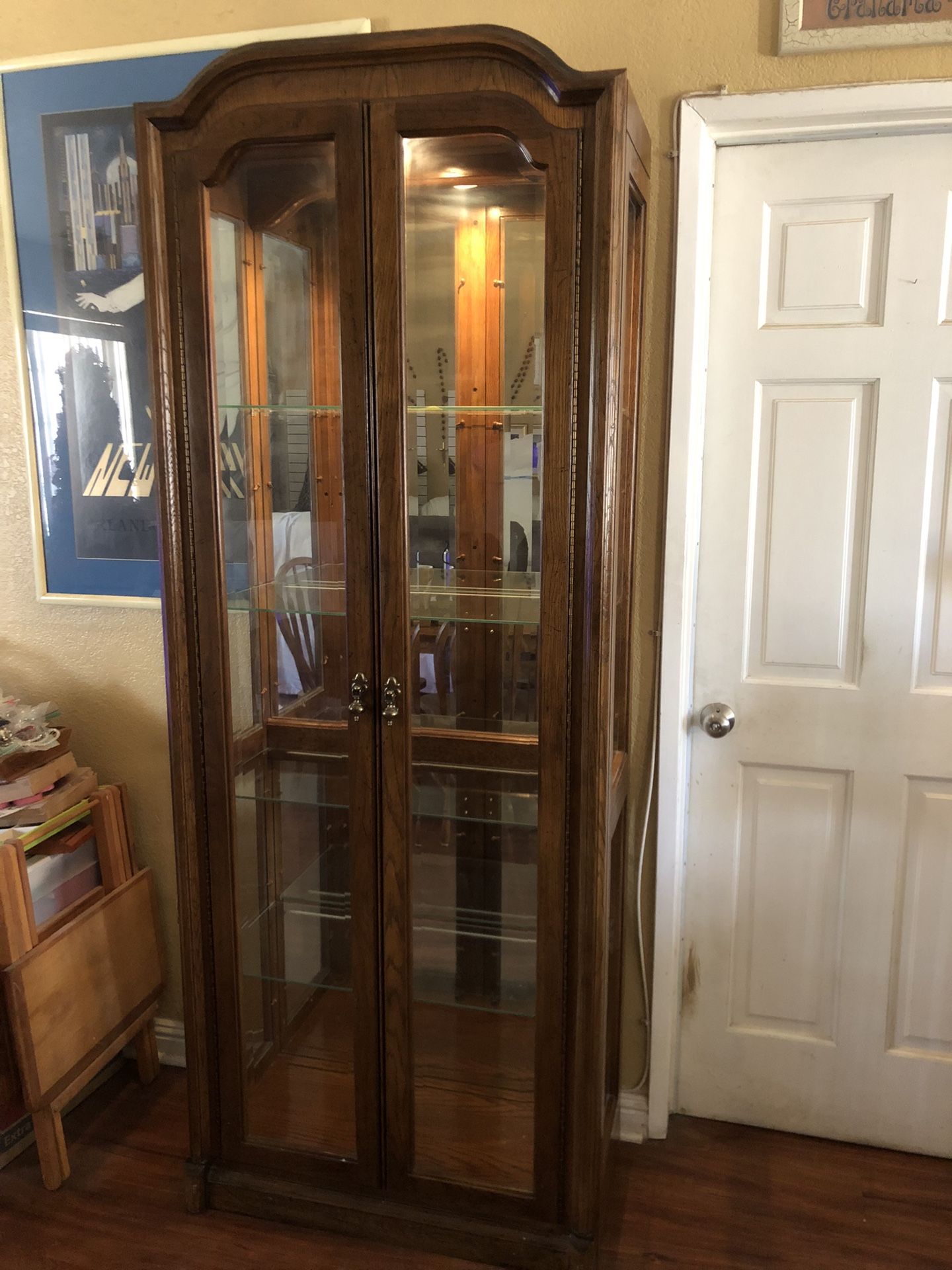 Beautiful China (Curio)Cabinet with glass shelves. Vendors Cabinet display.