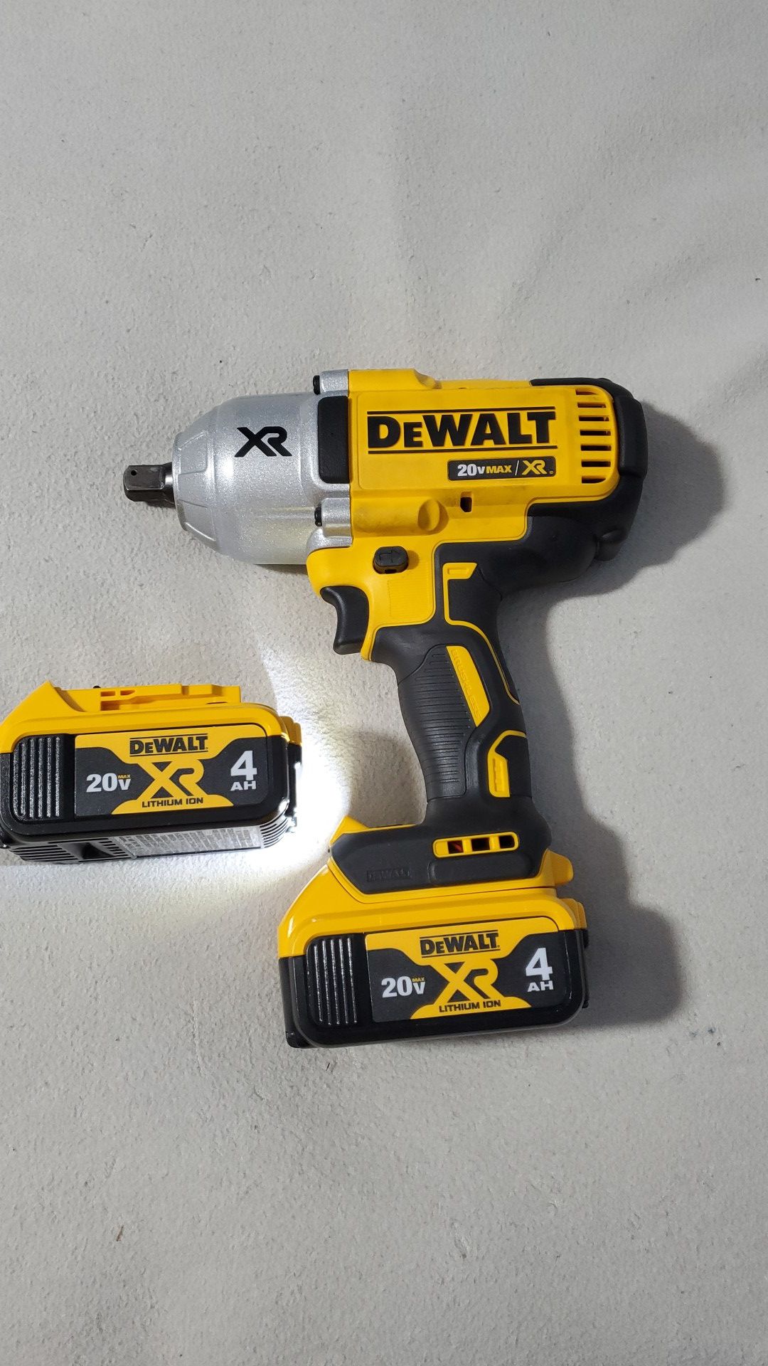Dewalt 20V Max XR Brushless 1/2in High Torque Impact Wrench. W/ 2 new 4ah XR batteries. Firm