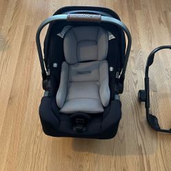 Nuna Pipa RX Infant Car Seat With Base And Stroller Attachement