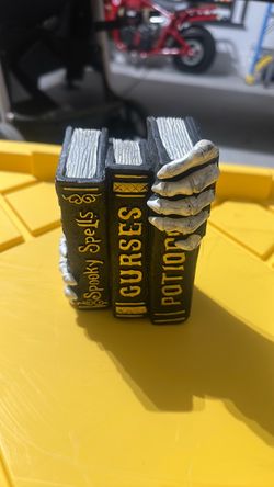 Skeleton Hand Spooky Books Resin Figurine