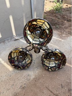 I have an old Tiffany-style chandelier and want to sell it.”