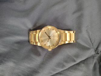 Gold Nixon Watch