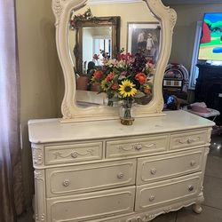Ornate cream dresser with mirror