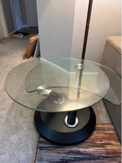 Stylish glass swivel table must go