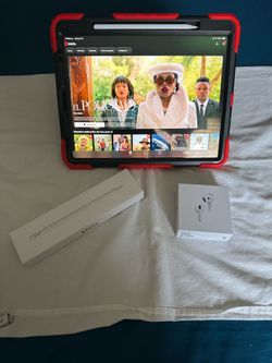 Apple iPad Pro 12.9-inch (4th gen 128GB Wi-Fi + Cellular and Apple Pencil 2 gen and Airpods 4th gen