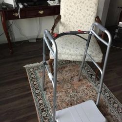 TWO BUTTON FOLDING WALKER