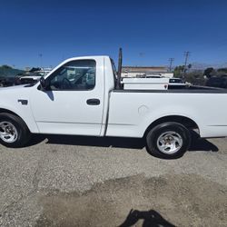 2003 ford F-150 4.6 v8 2wd 207k milles just smog cold ac clean title one owner reg current located in pomona 9o9236I97o runs good no problems ready fo