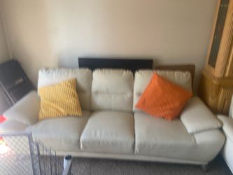 Cream white leather couches