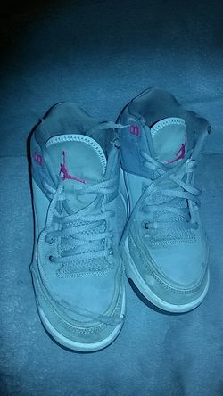 Very used girls gray Jordans size four