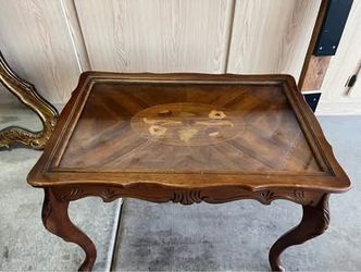 Vintage wooden side table with glass top