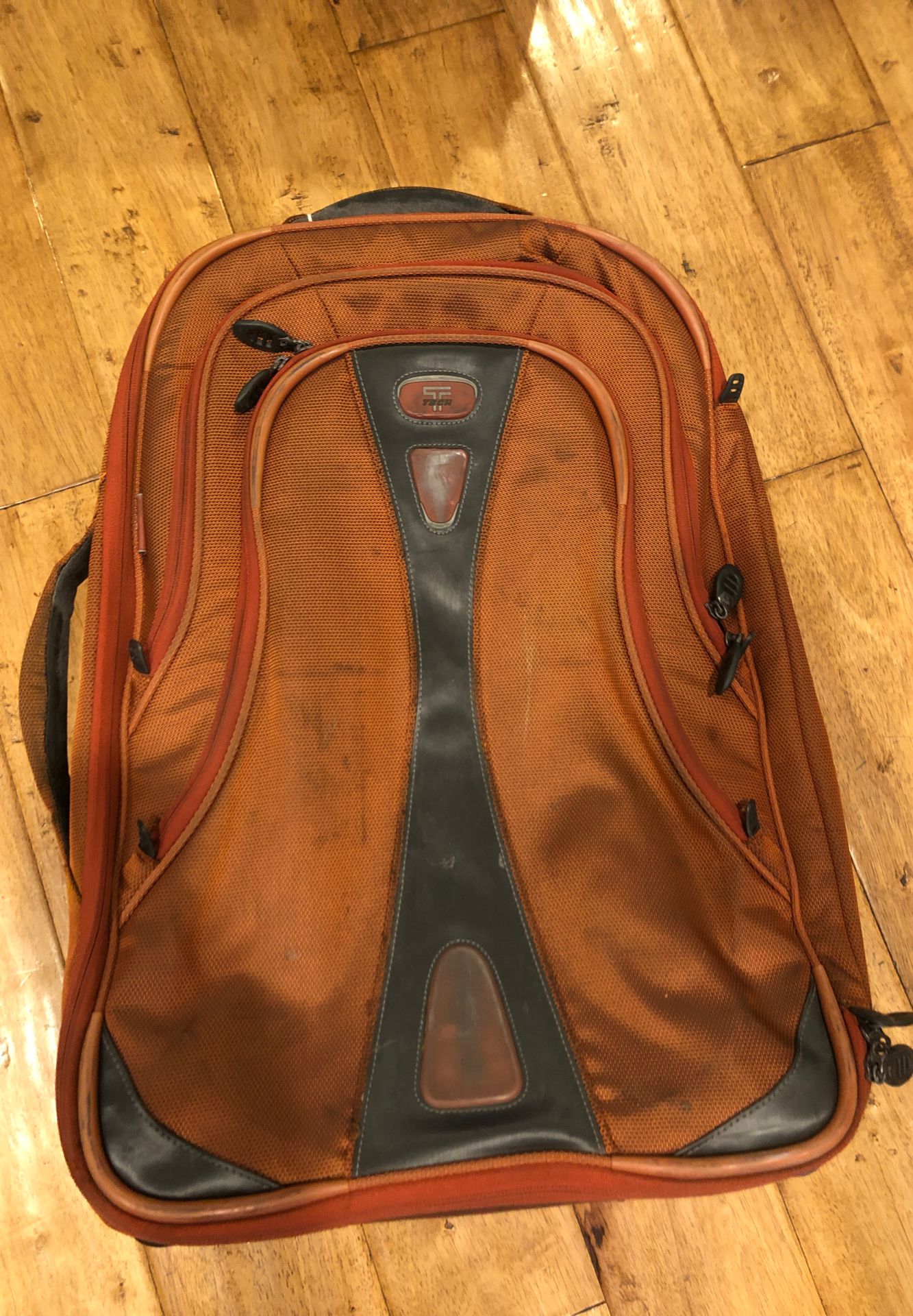 Genuine Tumi roller carry on suitcase
