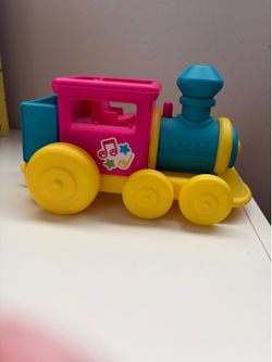 Musical CoComelon Toy Bus, Train, and Figure Set