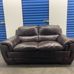 Comfy Leather Couch (free delivery)