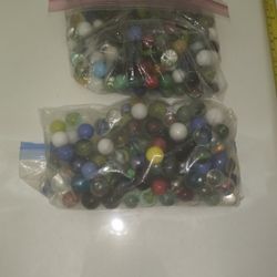 2 Bags Of Marbles