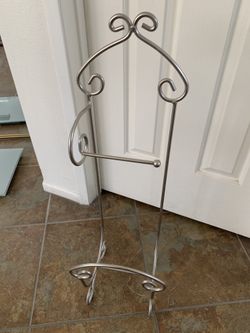 Toilet paper holder with magazine rack.
