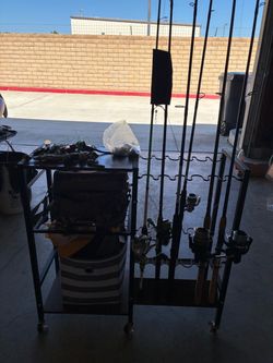 Fishing rod holder with storage