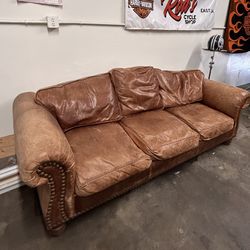 8’ Brown Leather sofa