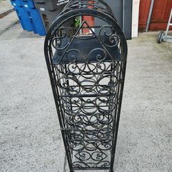 wrought iron wine rack. with locking latch