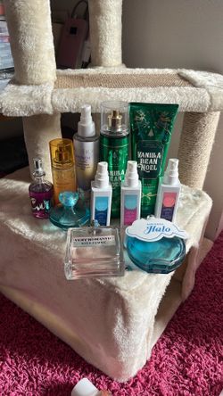 Several perfumes, mists, and a body lotion
