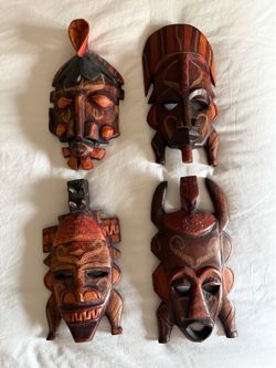 Set of 4 Hand-Carved African Tribal Wood Masks