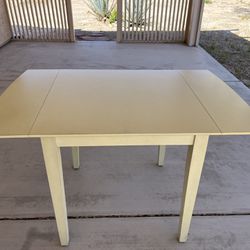 Kitchen Table with collapsible side leaves