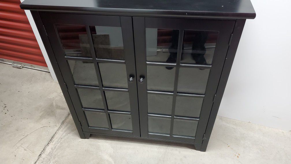 Cabinet with glass doors. Dining room