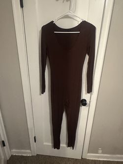 Brown women’s long sleeve jumpsuit size small