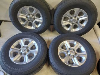 Ready to bolt on OEM  '05-'23 Toyota 4Runner Tacoma on Dunlop at20 grandtrek tires