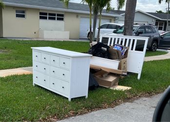 FREE on the curb for trash.  Hurry before it rains!!!