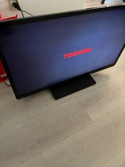 Toshiba Flat Screen TV with Stand (No remote)