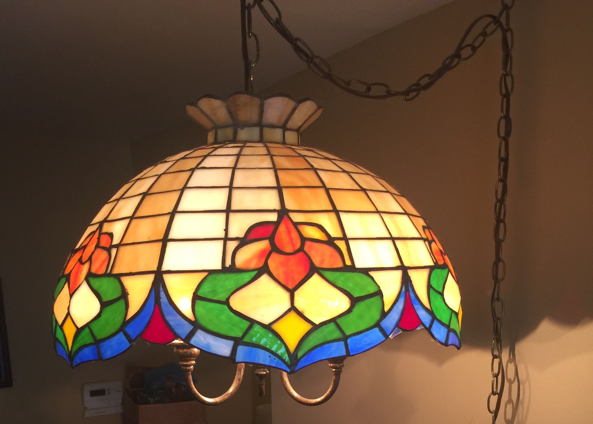 Pair of Tiffany inspired stained glass pendant light fixtures