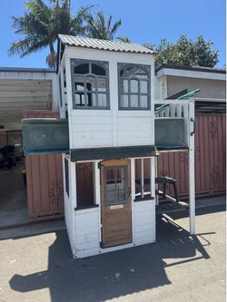 Play house with slide and ladder