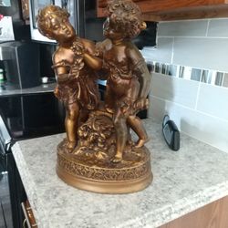 15.00 Solid Ceramic Boy And Girl. 171/2" H By 11"W